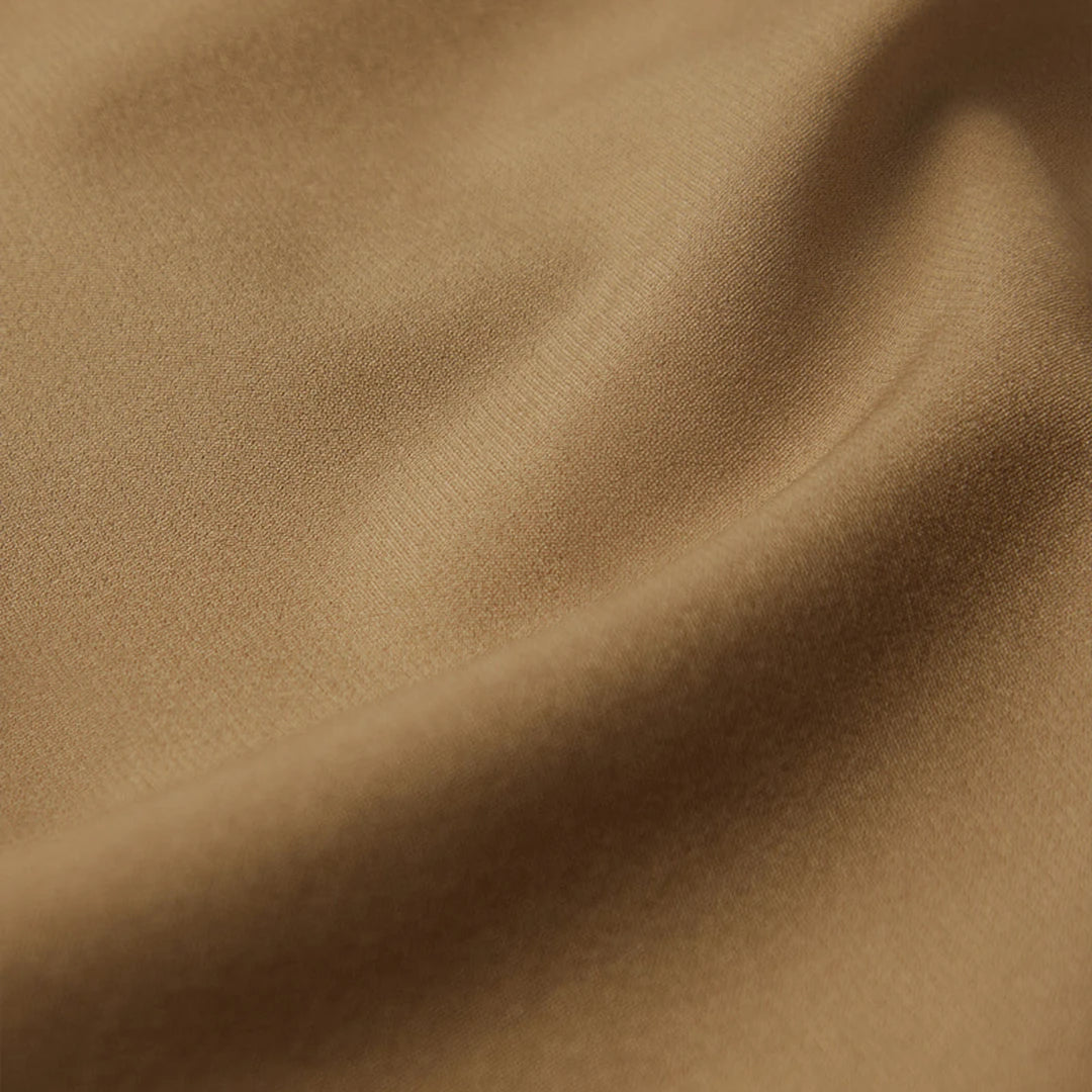 A brown Kensington trousers.